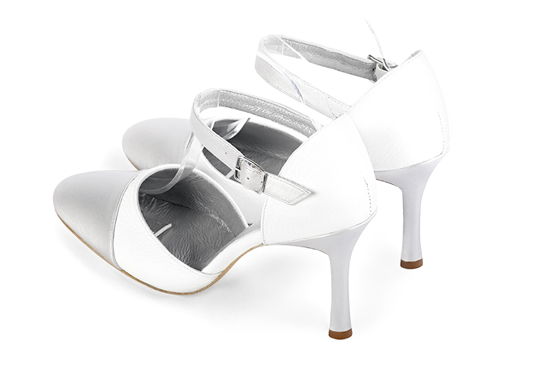 Light silver and pure white women's open side shoes, with an instep strap. Round toe. Very high slim heel. Rear view - Florence KOOIJMAN